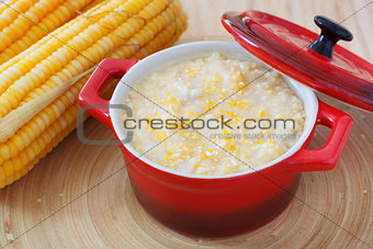 Corn porridge in red bowl