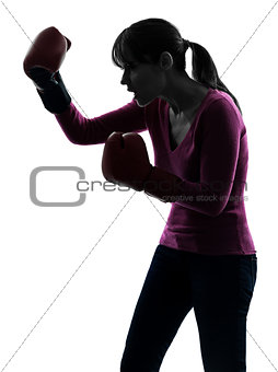 mature woman with boxing gloves silhouette