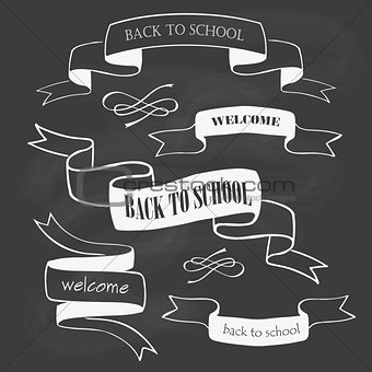 Set of back to school badges and ribbons on chalkboard