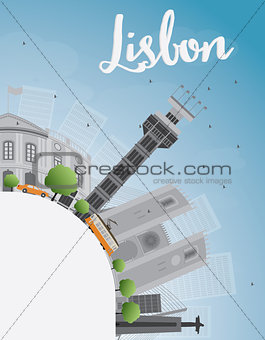 Lisbon city skyline with grey buildings, blue sky and copy space