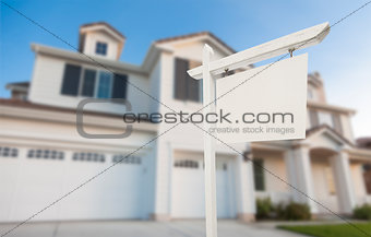 Blank Real Estate Sign in Front of New House 