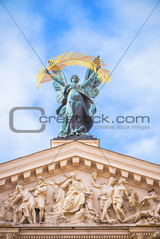 statue at opera theater in Lviv