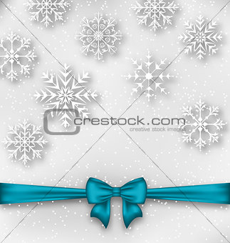 Christmas wrapping with bow ribbon and snowflakes