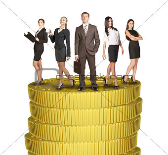 Group of business people standing on coins stack