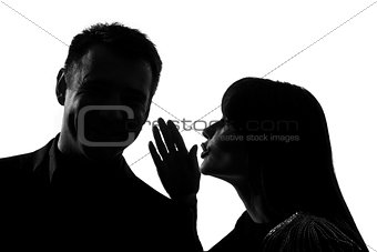 one couple man and woman whispering at ear silhouette