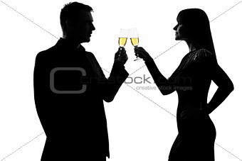 one couple man and woman drinking champagne partying toasting si