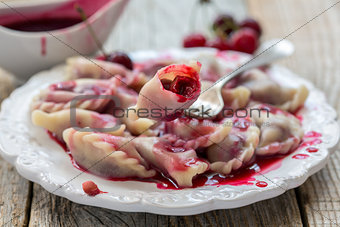 Dumplings with a cherry.