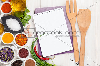 Various spices on white wooden background