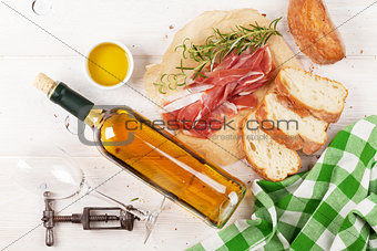 Prosciutto, wine, ciabatta, parmesan and olive oil