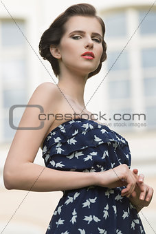 charming woman in outdoor fashion shoot 