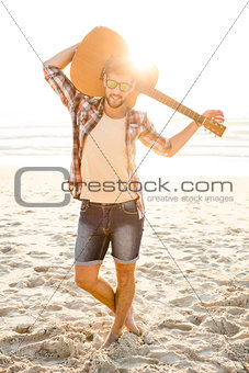 Handsome young man at the beach