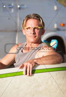 Cute Surfer with Surfboard