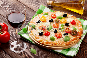 Italian pizza and red wine