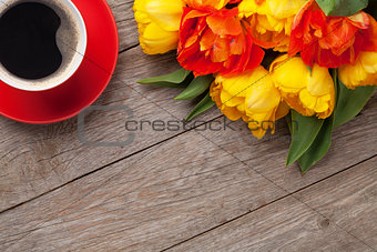 Colorful tulips and coffee cup