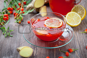 Tea with fresh goji berries and ginger