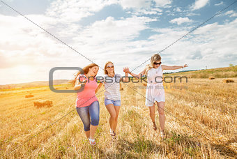 Three best friends having fun outdoors 