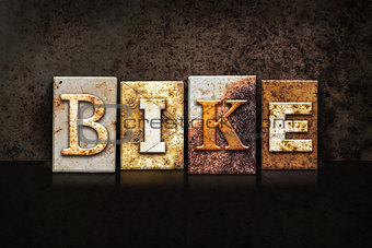 Bike Letterpress Concept on Dark Background