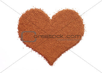 Instant coffee granules in a heart shape