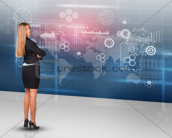 Businesslady looking at camera, rear view