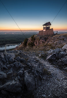 Wooden Tourist Observation Tower over a Landscape at Dusk
