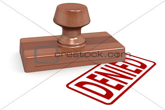 Wooden stamp denied with red text