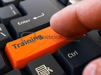 Finger Presses Orange Keyboard Button Training.