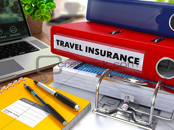 Red Ring Binder with Inscription Travel Insurance.
