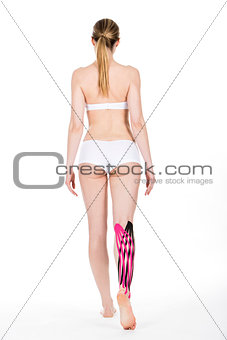 woman with drenage tape on calf