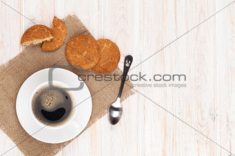 Coffee cup, gingerbread cookies and spoon