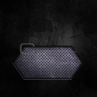Dark grunge background with cutout showing perforated metal