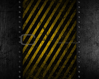 Grunge metal background with yellow and black distressed texture