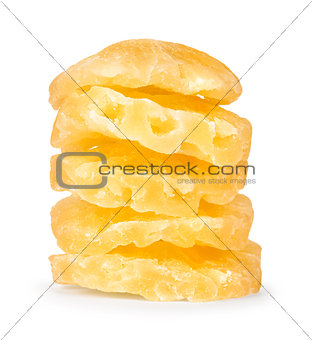 stack of slices of dried pineapple on a white background