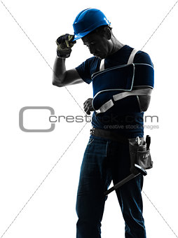 injured manual worker man with injury brace despair silhouette