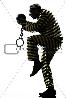 man prisoner criminal with chain ball silhouette escaping