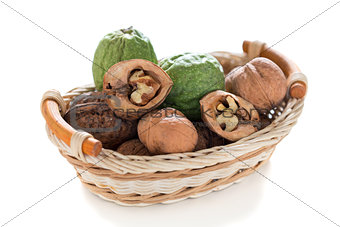 Walnuts in a wicker basket.