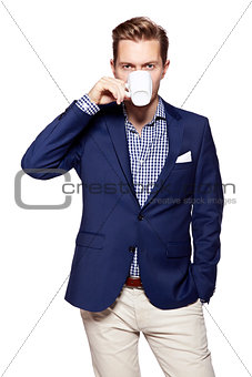 Businessman man with coffee looking at camera