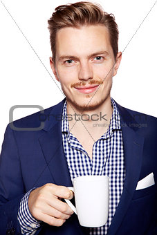 Handsome man with coffee looking at camera