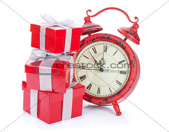 Christmas clock and three gift boxes