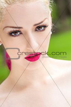 Beautiful Woman With Blond and Magenta Pink Hair