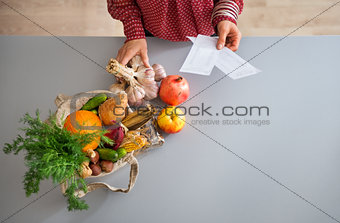 Closeup from above of fall fruits and vegetables in kitchen