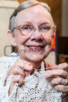 Smiling Old Woman with Crochet