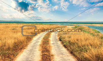 Meandering road to sea