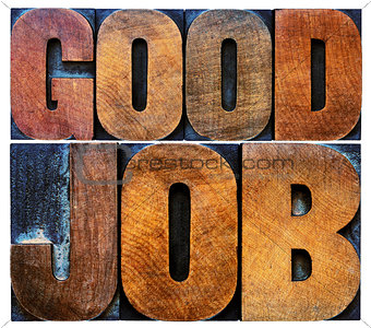good job word abstract in wood type
