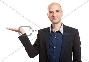 young man displaying invisible product over white