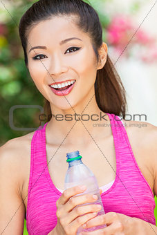 Asian Chinese Woman Exercising Drinking Bottle of Water
