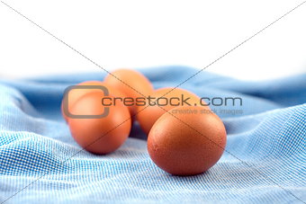 Eggs on blue cloth