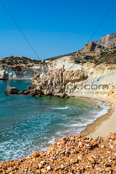 Golden beach and coastline at the Greek island of Milos