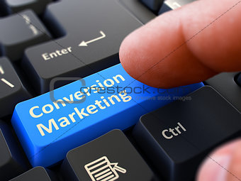 Press Button Conversion Marketing on Black Keyboard.
