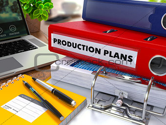 Red Ring Binder with Inscription Production Plans.