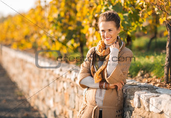 Portrait of relaxed young woman in autumn outdoors